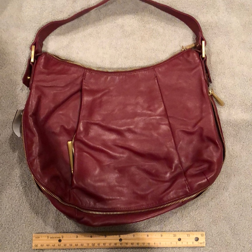 Red leather hobo bag